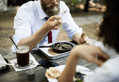 a man eats the right food to increase potency