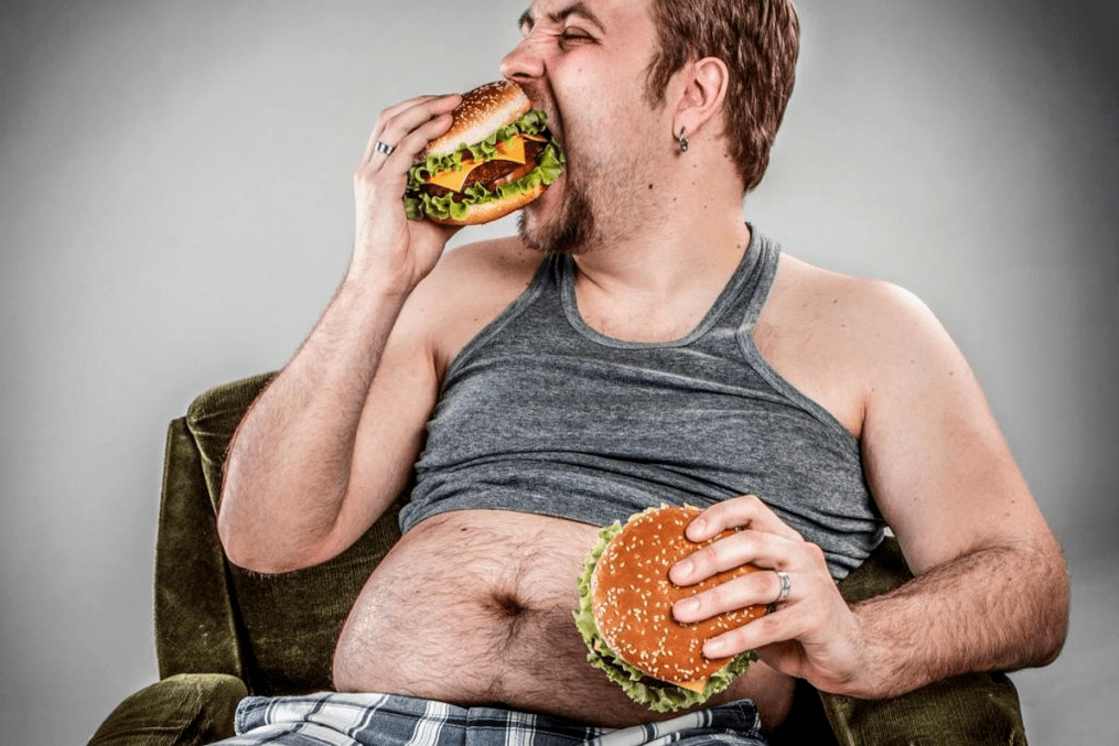 man eats junk food